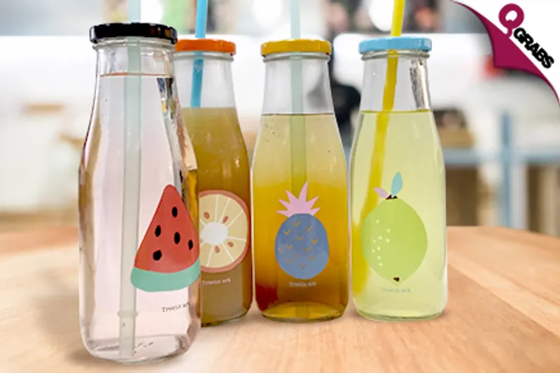 From QR25 Sip in Style with a set of Two or Four Glass Bottles in 4 Different Cute Colors! (Up to QR98 Value)